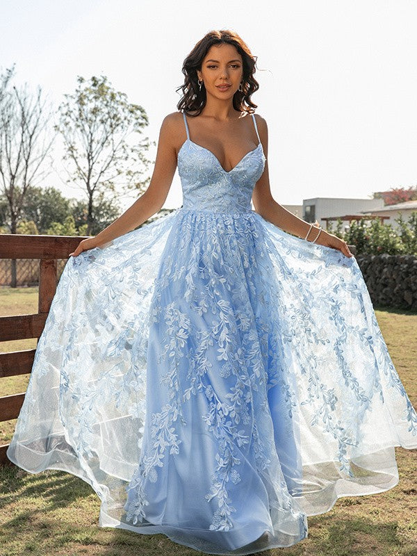 Lace ruffle detail on an A-line sleeveless prom dress with sweep train