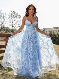 Lace ruffle detail on an A-line sleeveless prom dress with sweep train
