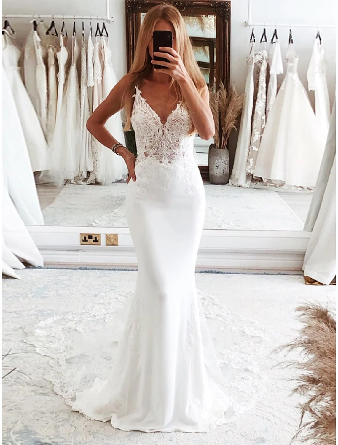 Front view of sleeveless camisole mermaid tulle wedding dress with appliques in White
