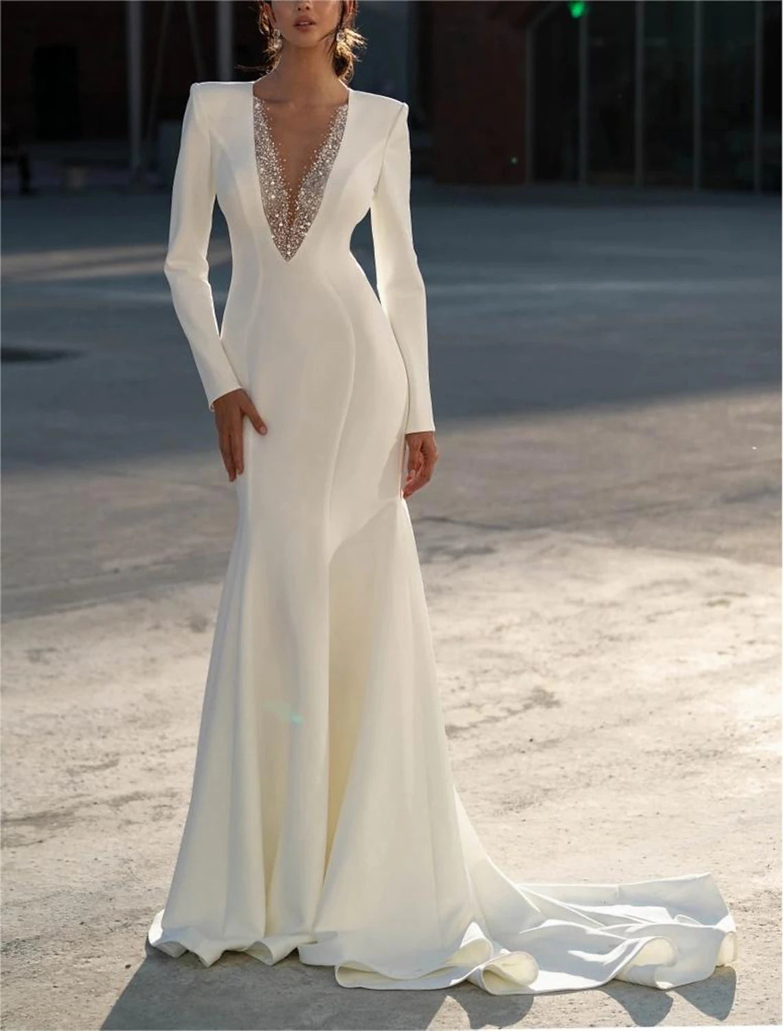 V-neck long sleeve chiffon mermaid wedding dress with beading and sweep train in Ivory