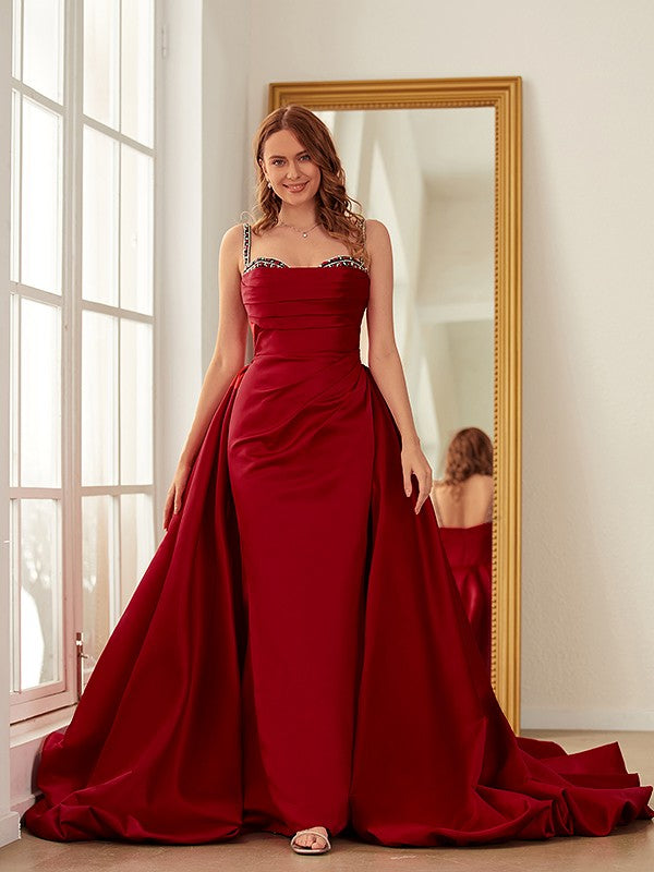 Sheath column prom dress in satin featuring spaghetti straps and chapel train