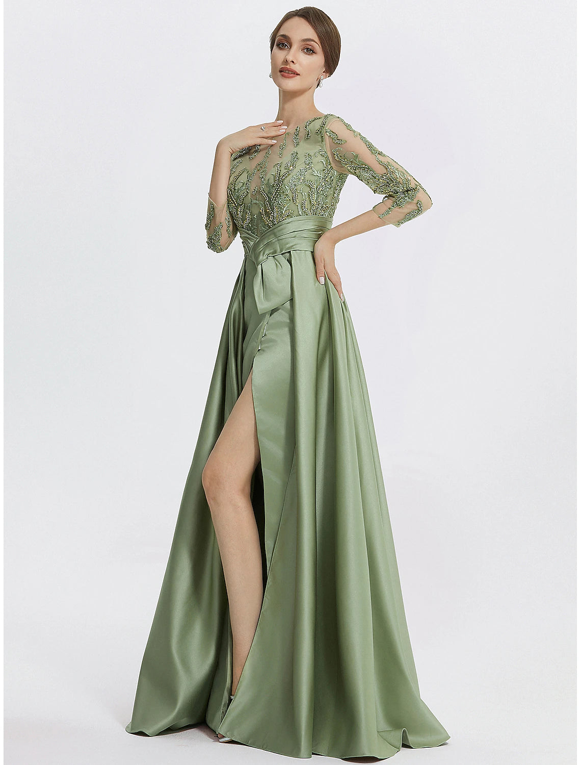 Floor length A-line satin evening gown in Clover with 3/4 sleeves, embroidery appliques, and a slit