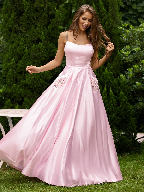 A-line floor-length prom dress in satin with applique and spaghetti straps