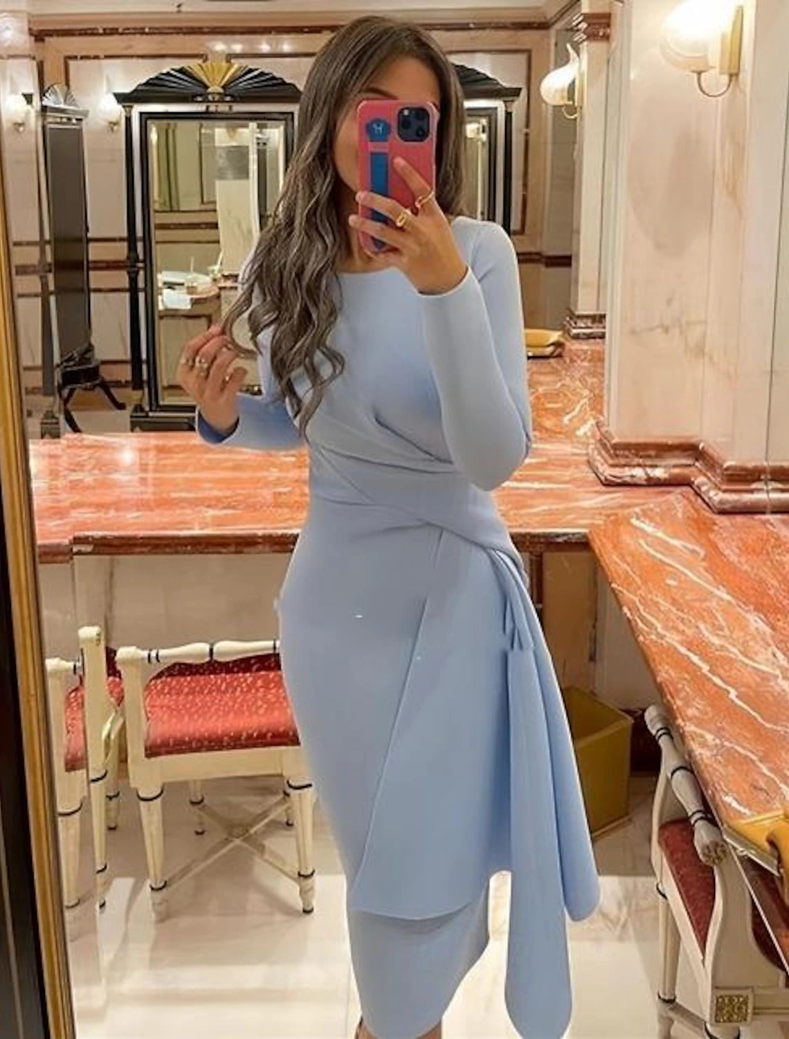 Long sleeve knee-length sheath cocktail dress with pleated details