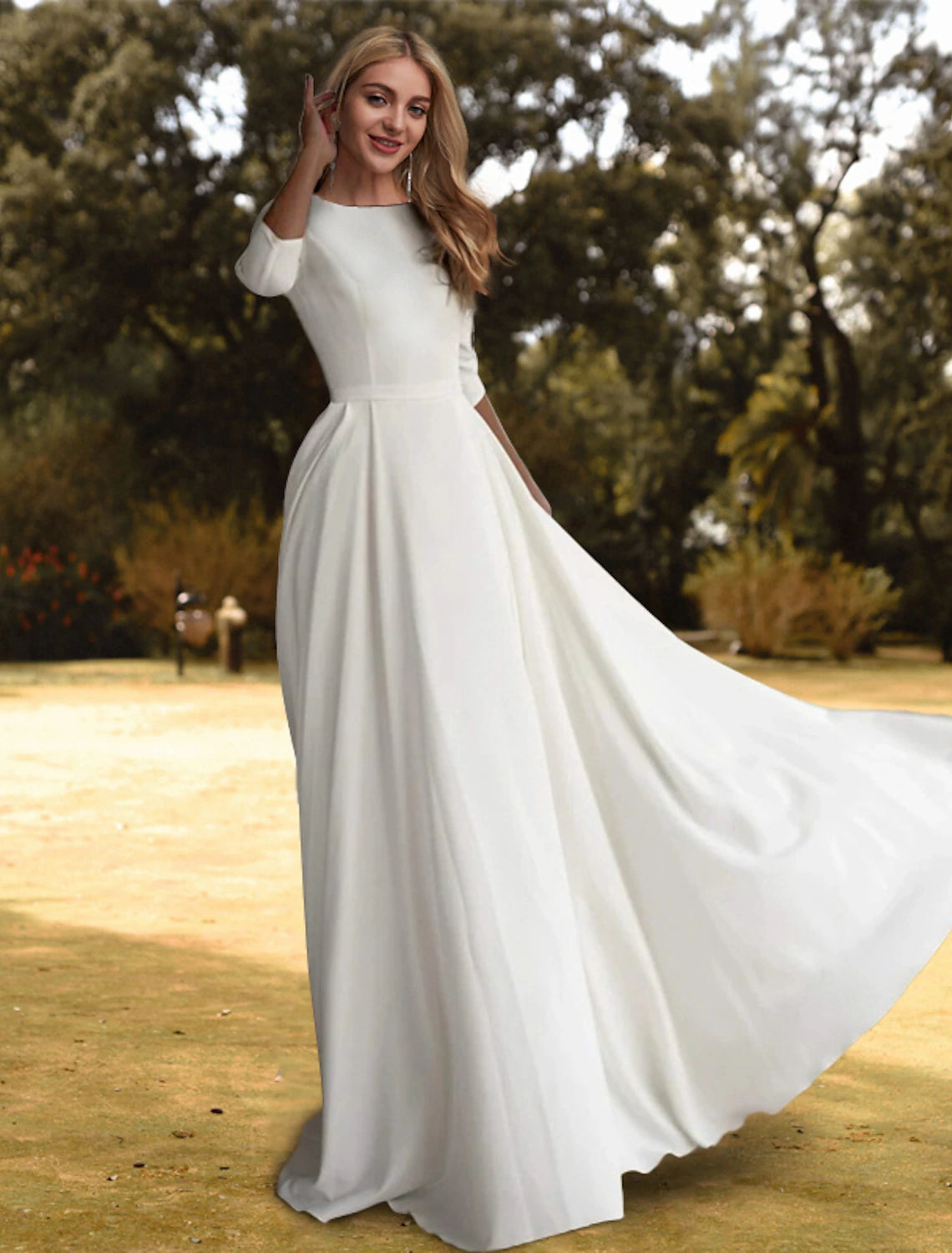 White A-line wedding dress featuring scoop neckline, 3/4 length sleeves, and pleated stretch fabric