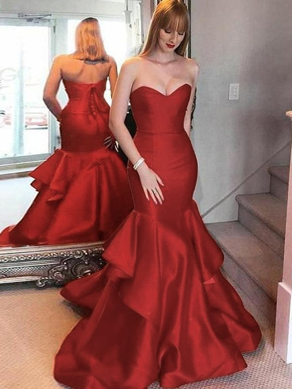 Trumpet/mermaid satin prom dress with sweetheart sleeveless bodice, ruffles, and sweep/brush train