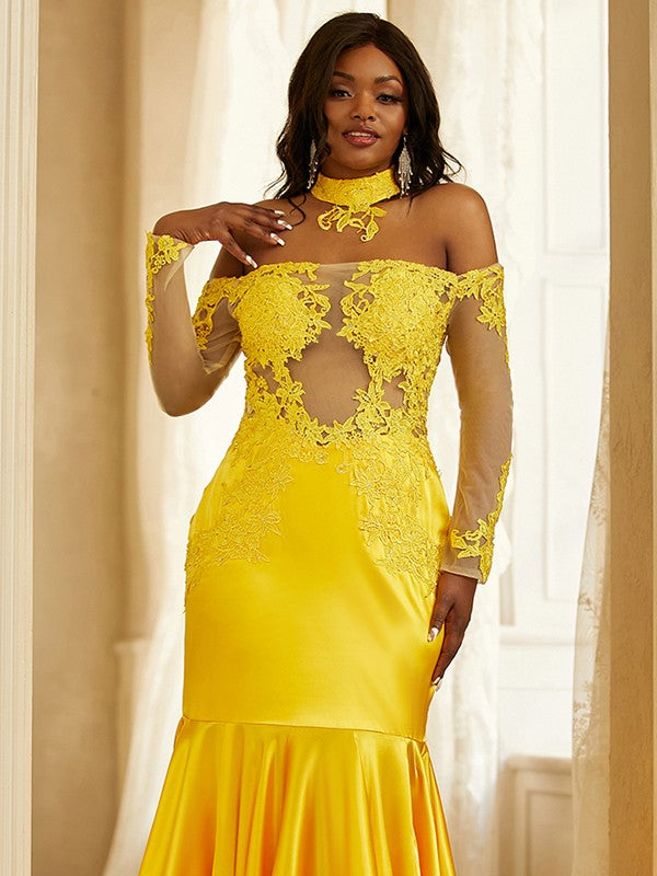 Sweep/brush train and long sleeves on an off-the-shoulder trumpet/mermaid prom dress