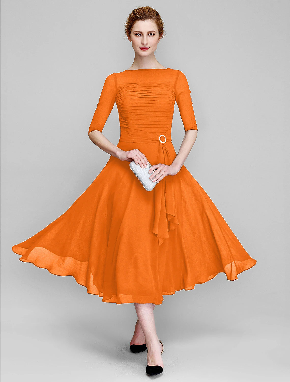 Bateau neck mother of the bride dress with ruched half sleeves in tea length chiffon