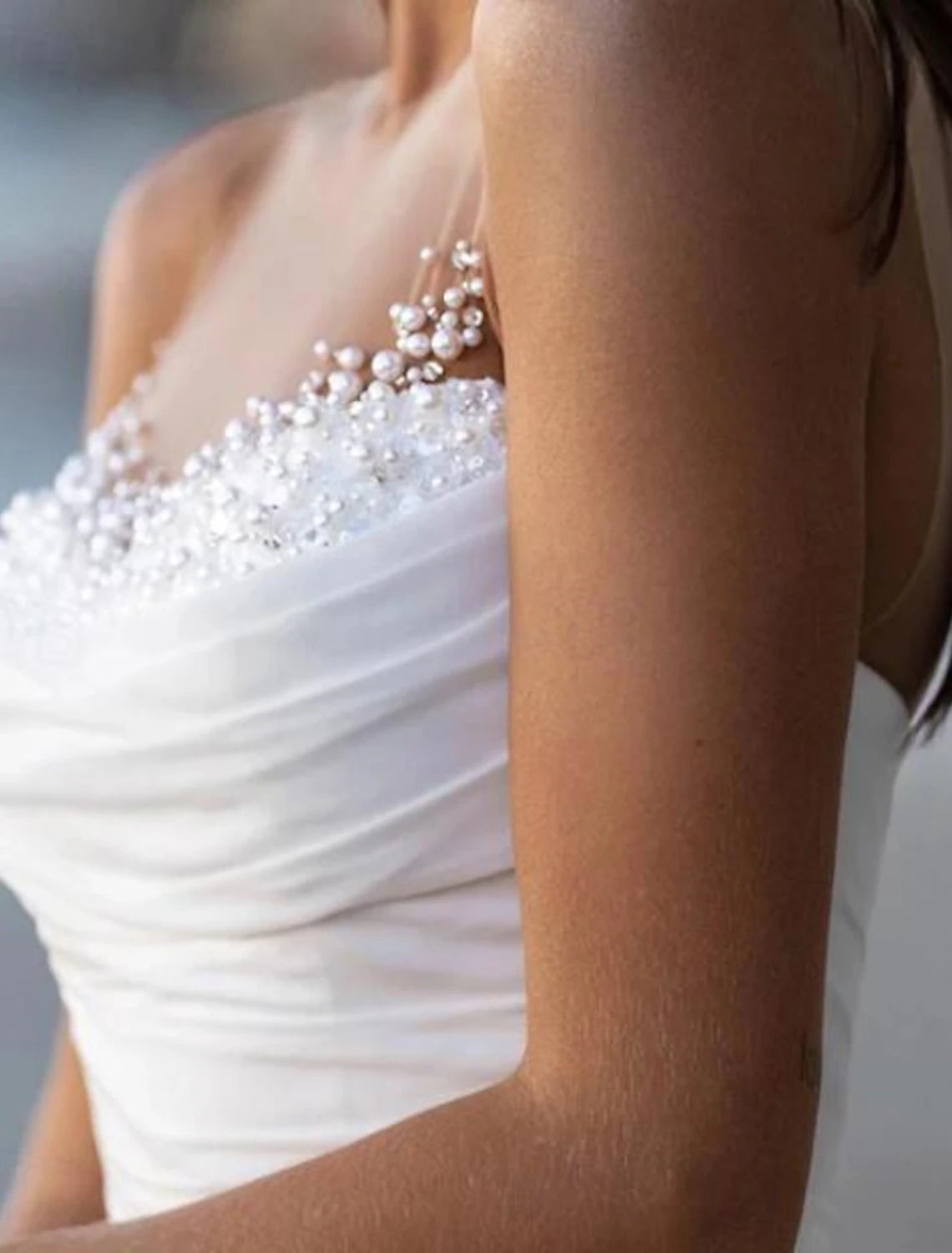 Solid color tulle A-line bridal dress with boat neck and brush train