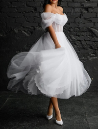 Solid color tea length satin wedding dress with A-line skirt and scoop neck