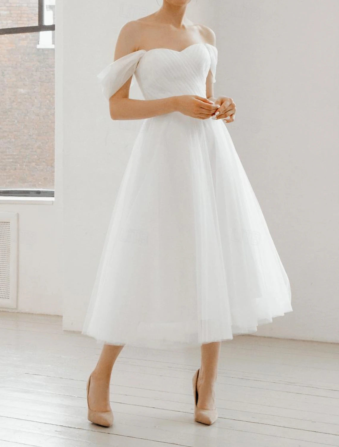Off-the-shoulder ruched tea-length chiffon A-line wedding dress in white