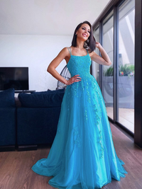 A-line tulle prom dress with spaghetti straps and applique detailing