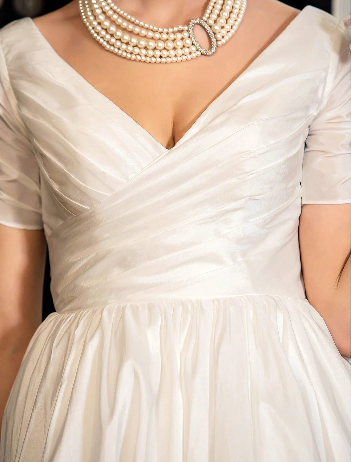 Vintage tea length ivory satin A-line bridal dress with short sleeves