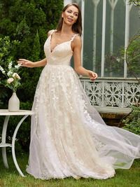Sleeveless tulle and lace A-line prom dress featuring a sweep brush train