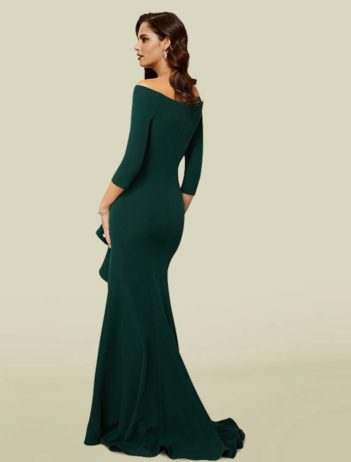 Dark green mermaid mother of the bride dress featuring draping and court train
