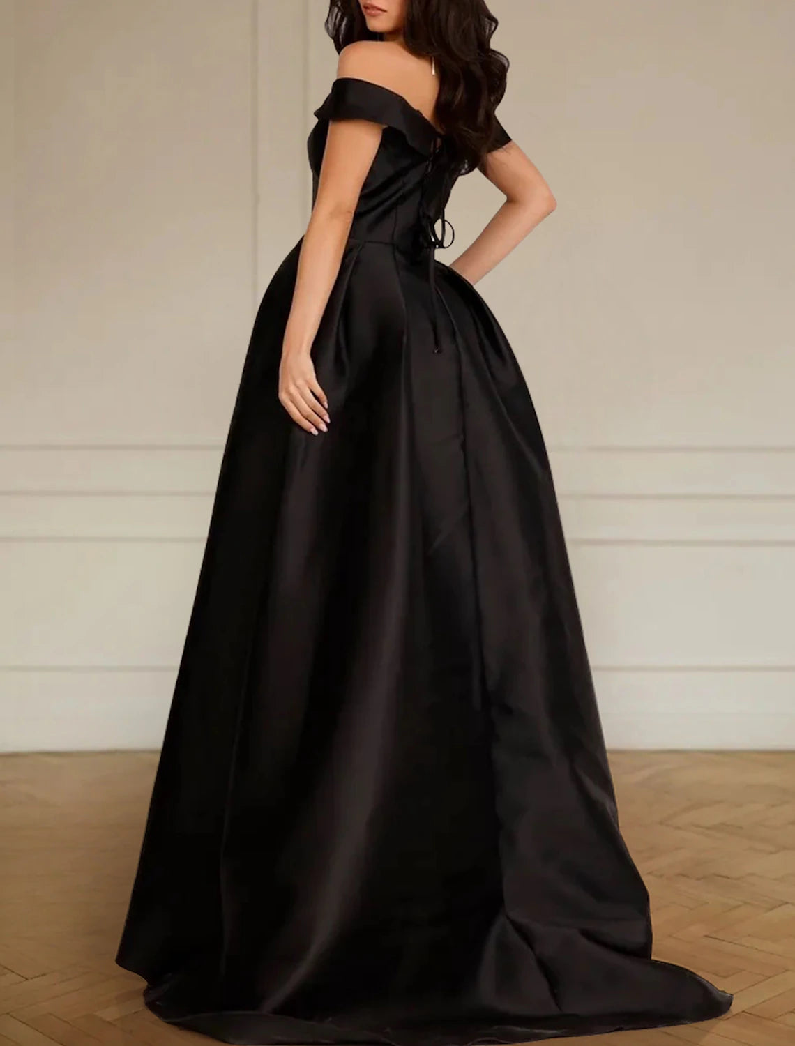Sleeveless off-the-shoulder satin bridal gown with sweep train and split front