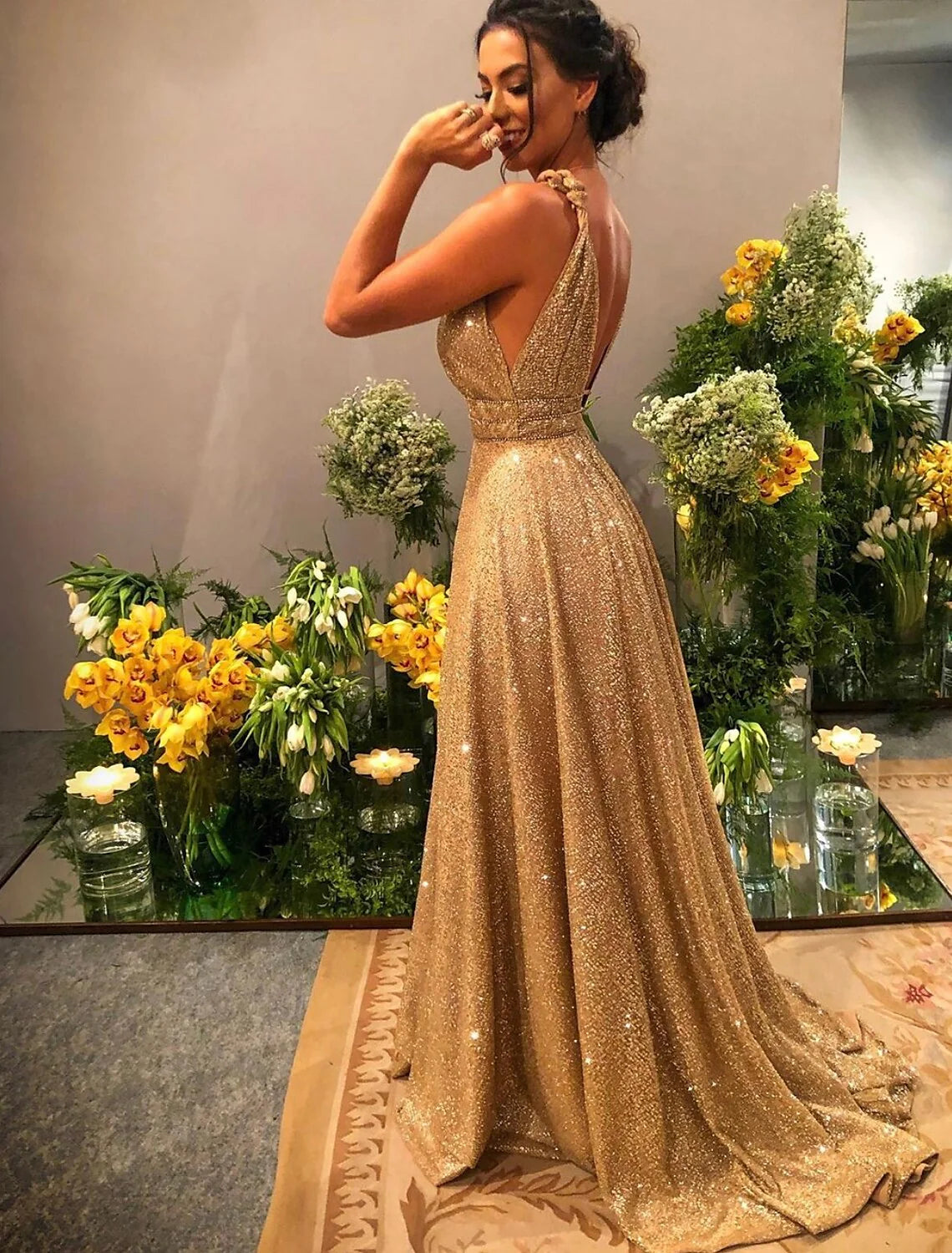 Gold glittering A-line prom dress with rhinestone backless styling and sweep train