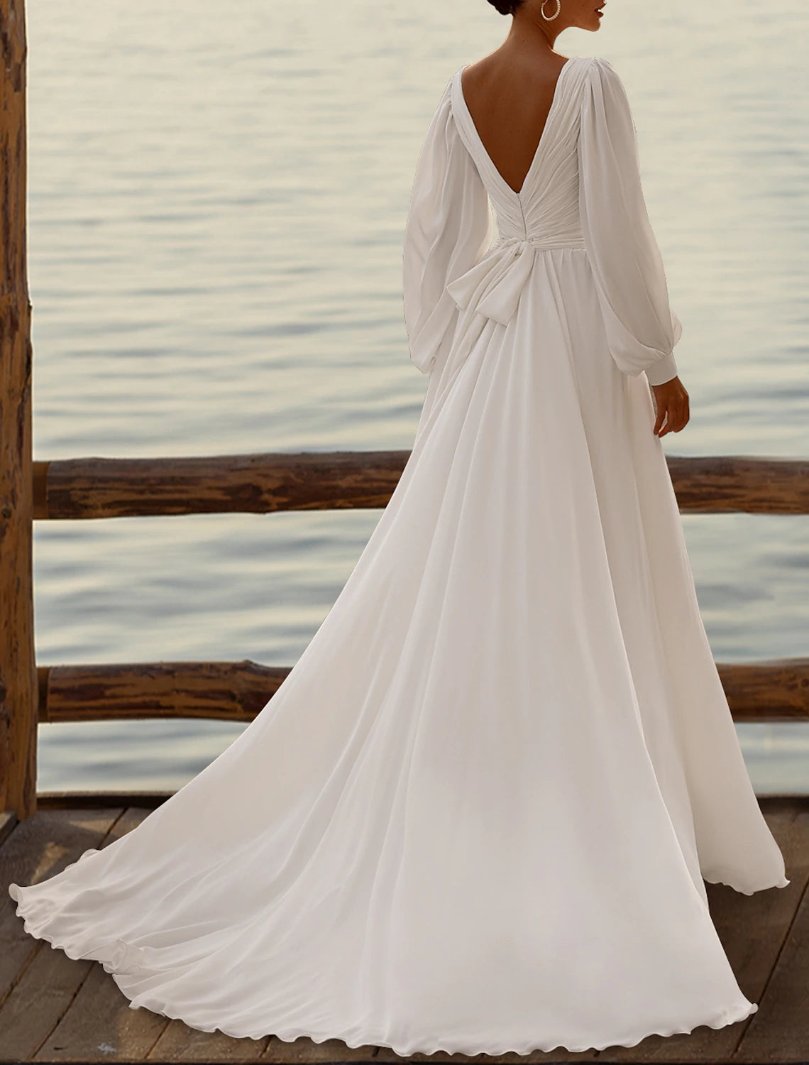 Ivory pleated tea length chiffon bridal gown with sleeveless camisole top