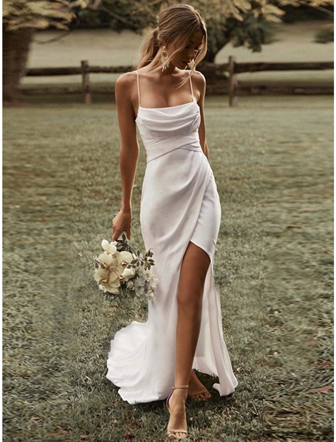 Simple beach sheath wedding dress with square camisole neckline, spaghetti straps, and ruched split front