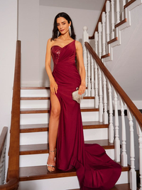 Close-up of ruched bodice and one-shoulder strap on jersey prom dress