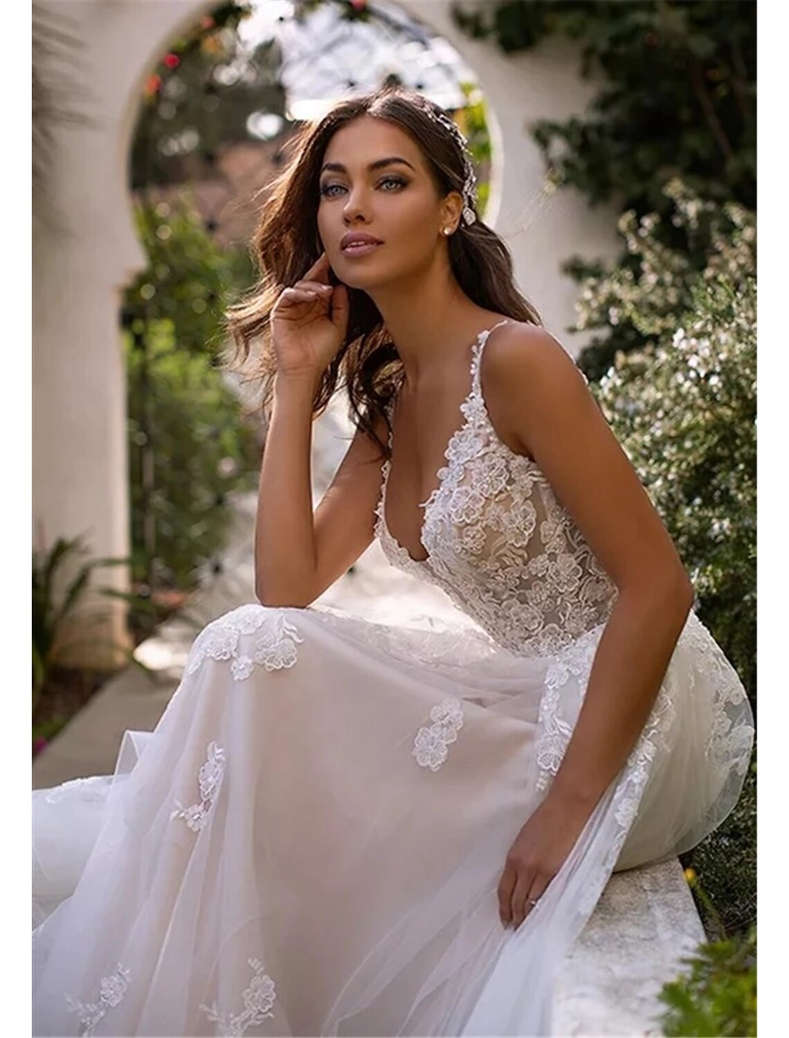 Bodice view of ivory wedding gown showing sweetheart neckline and regular straps