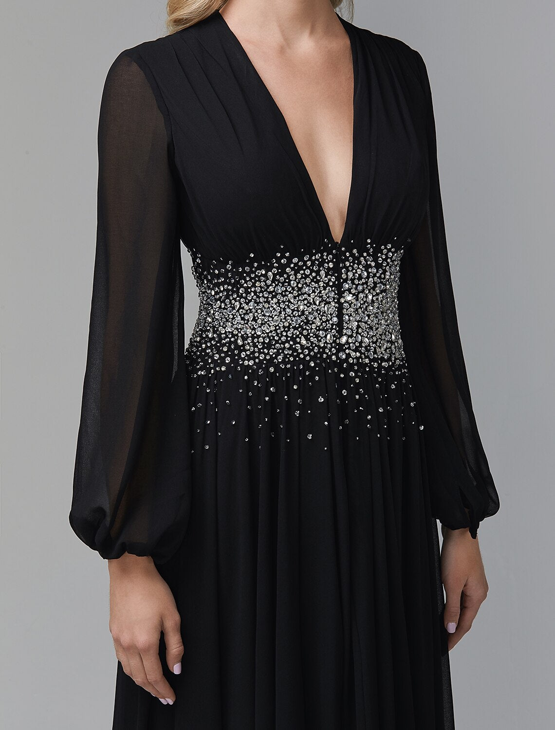 Detail of sequin accents on V-neck long-sleeve chiffon formal evening dress