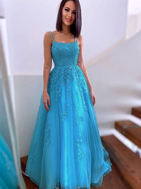 A-line tulle prom dress with delicate spaghetti straps and sweep brush train