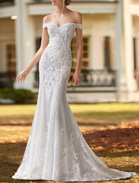 Two-piece ivory satin wedding dress with court train and detailed beading appliques