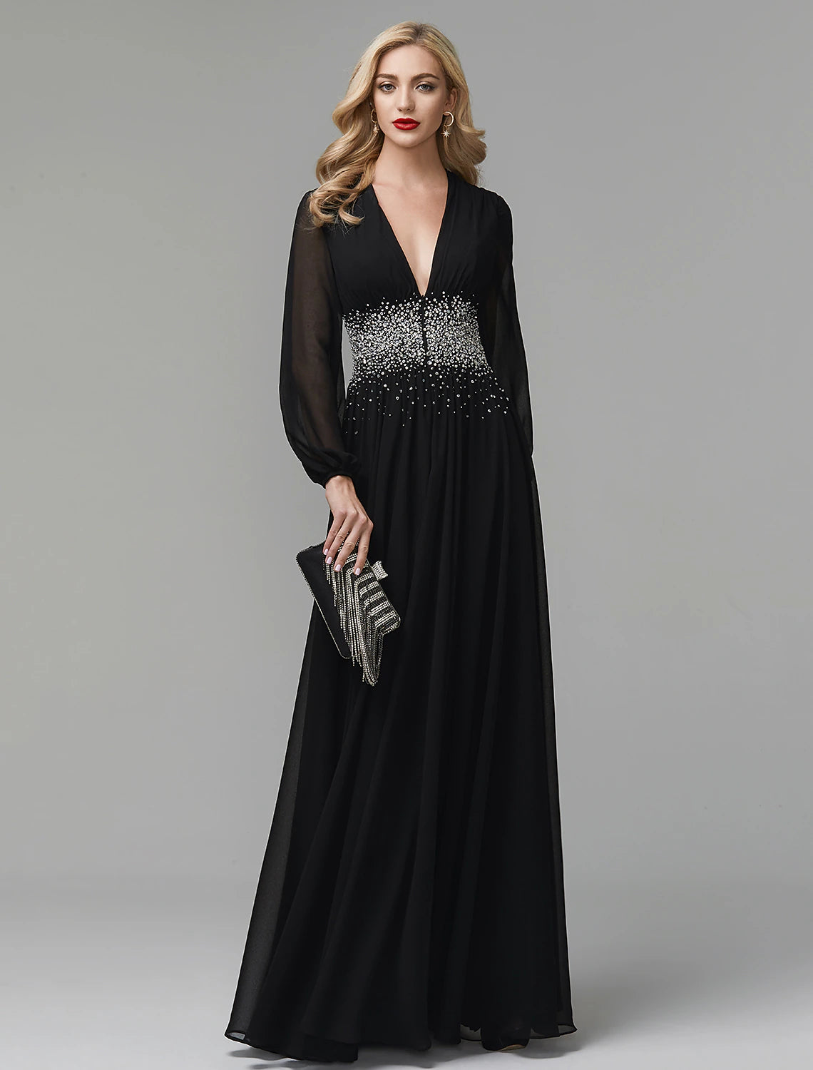 Full-length view of long-sleeve A-line chiffon formal gown featuring sequin accents