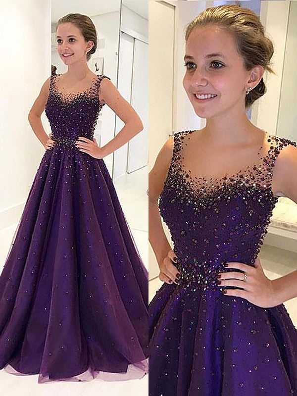 Floor-length A-line tulle prom dress with scoop neckline, sleeveless bodice, and beading