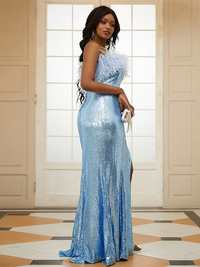 Sheath prom dress featuring strapless neckline, sequins, and sweep train