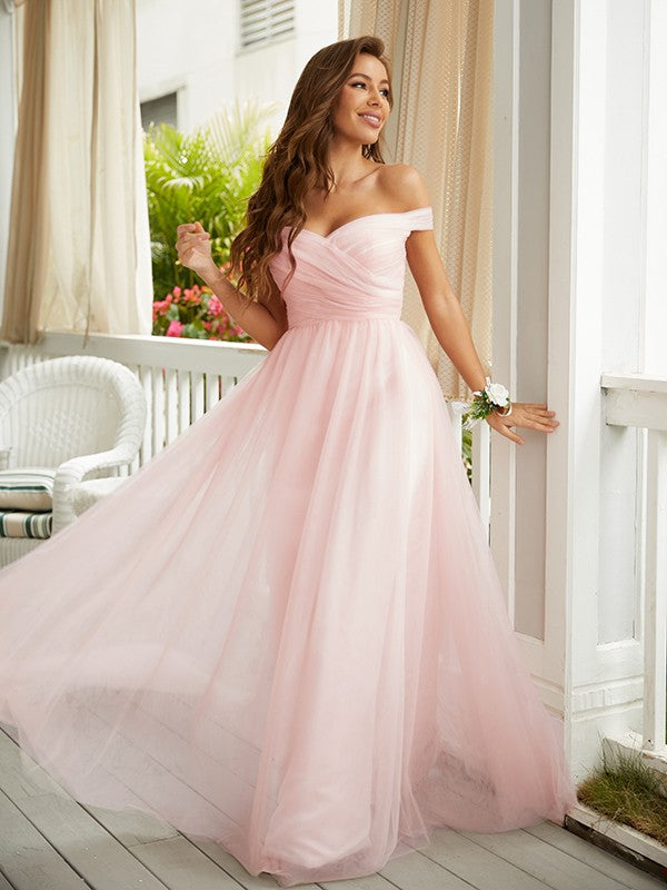 Front view of A-line off-the-shoulder ruched tulle floor-length prom dress
