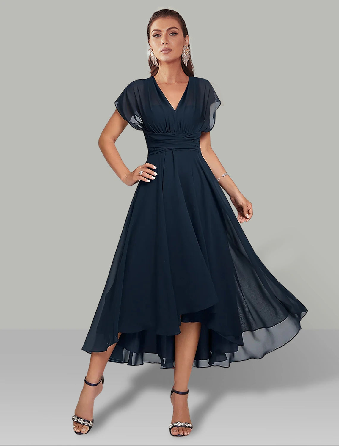 Flowing tea-length A-line chiffon skirt on wedding guest dress
