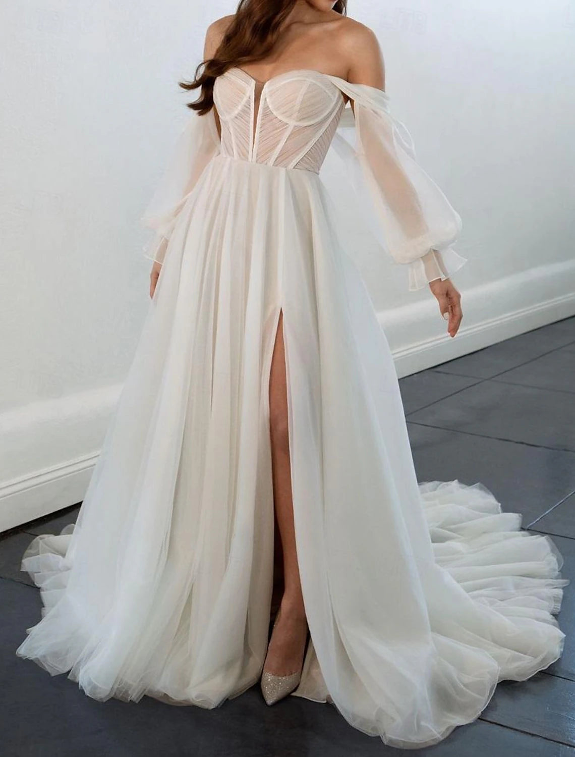 Long sleeve off-shoulder ruched chiffon wedding dress with A-line skirt and court train in white