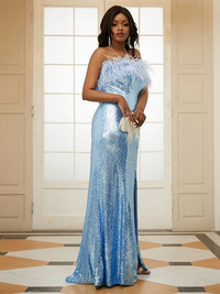 Strapless column prom dress with sequins, feathers, and brush train