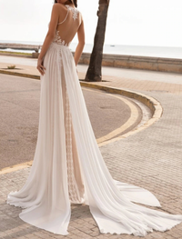 Ivory chiffon A-line halter wedding dress with delicate embroidery