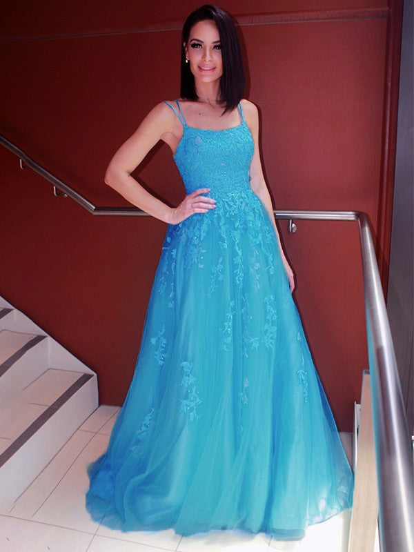 Sweep train and applique accents on sleeveless A-line tulle prom dress