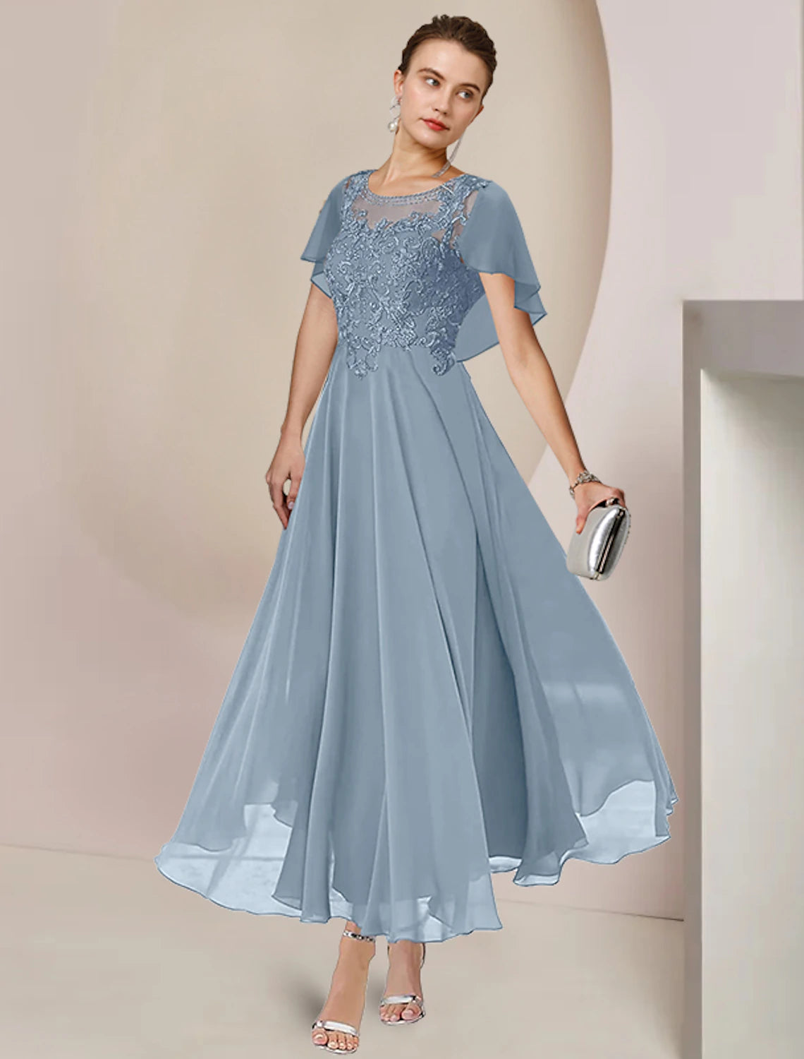 Tea-length A-line chiffon and lace mother of the bride dress featuring scoop neck and beading appliques