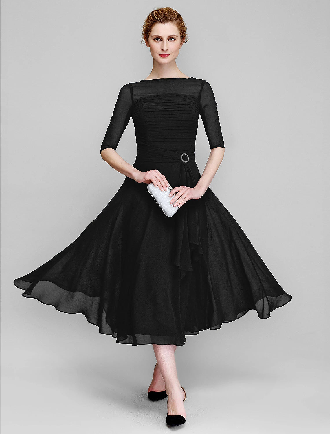 A-line wedding guest dress in tea length chiffon with ruched half sleeves