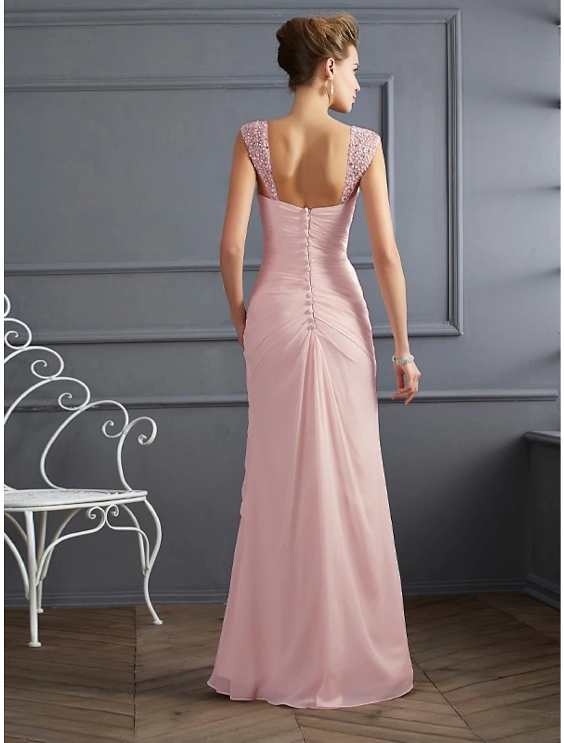 Sleeveless pink chiffon mermaid evening dress with spaghetti straps and rhinestone ruched bodice