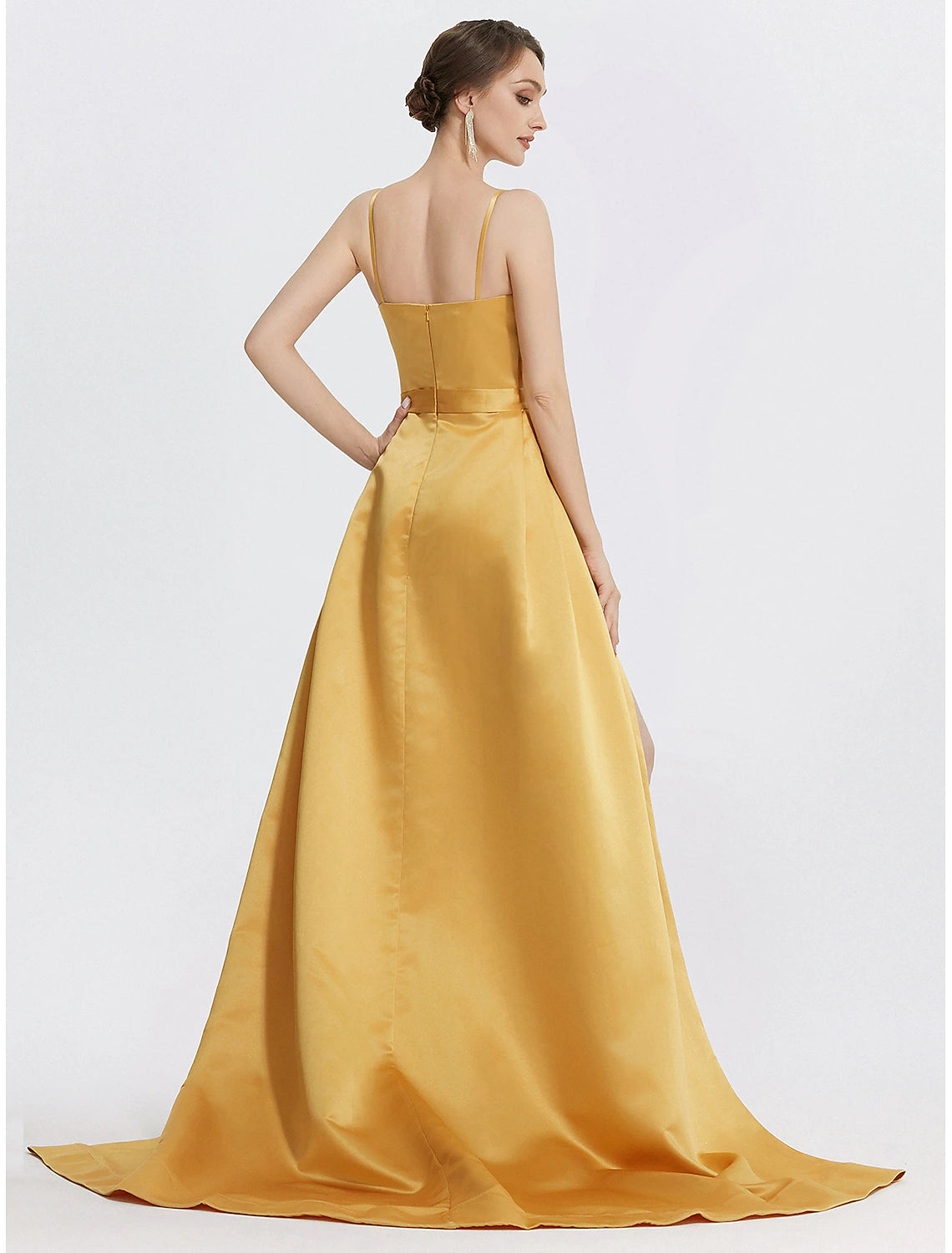 A-line evening gown with spaghetti straps, ruched satin fabric, and brush train