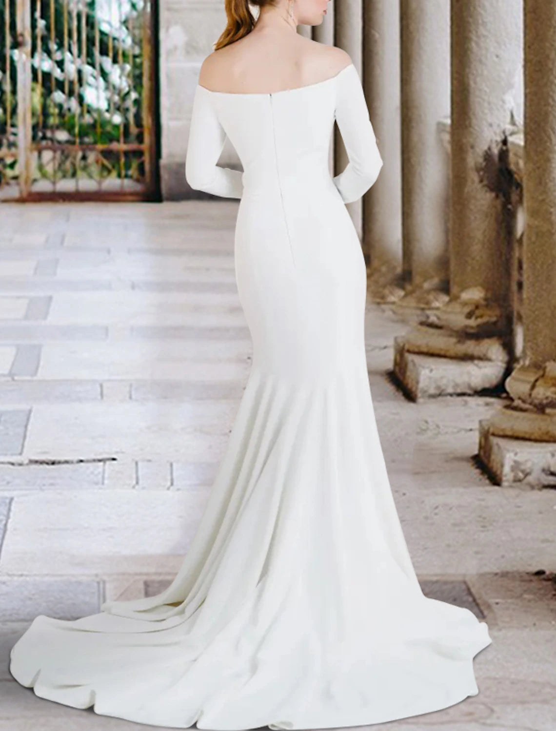 Ivory long sleeve mermaid bridal gown with court train and off-shoulder neckline