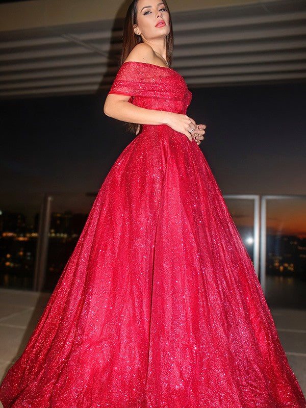 Red ball gown prom dress featuring an off-the-shoulder neckline and ruffles