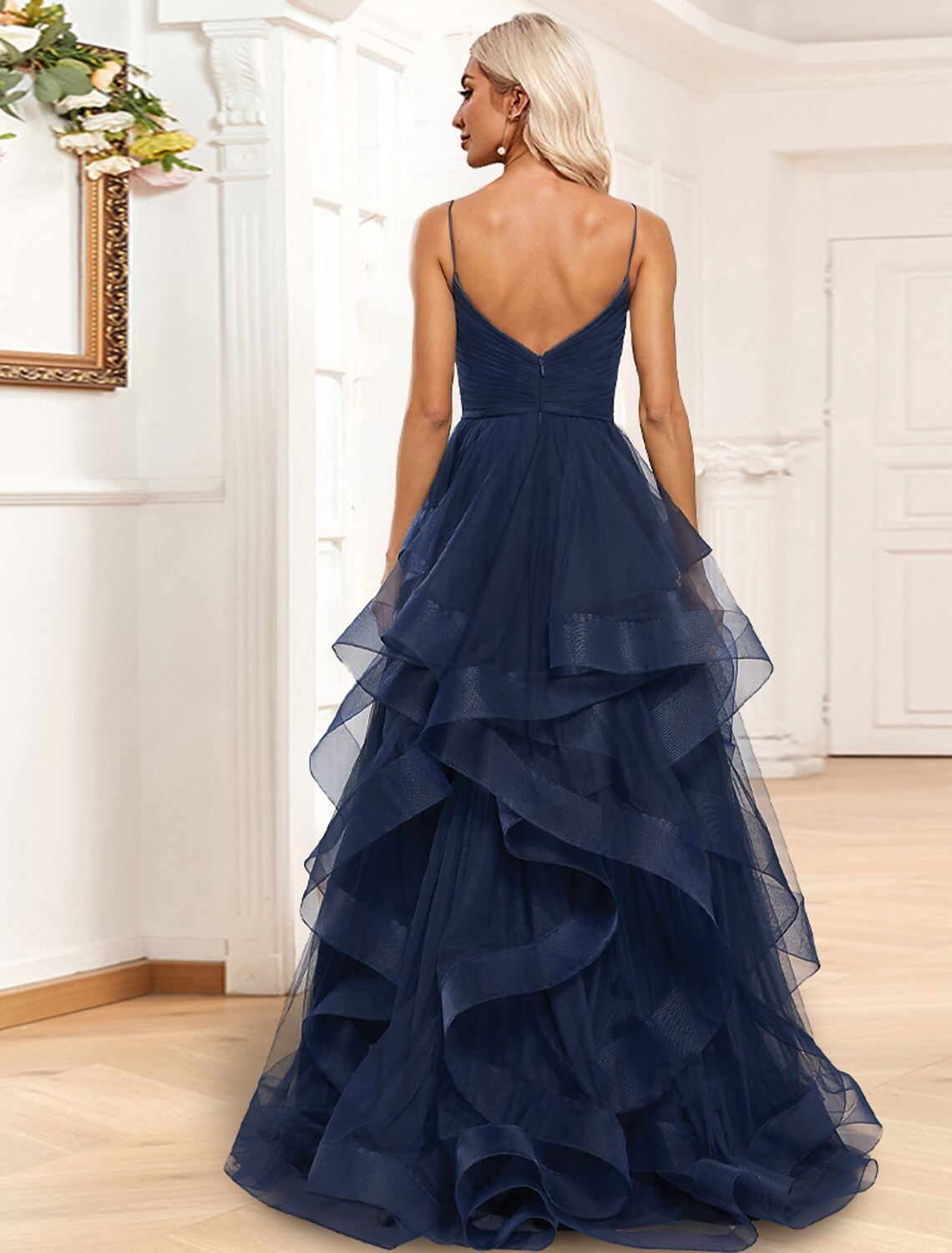 A-line sleeveless organza evening gown featuring ruched ruffles and a sweep / brush train