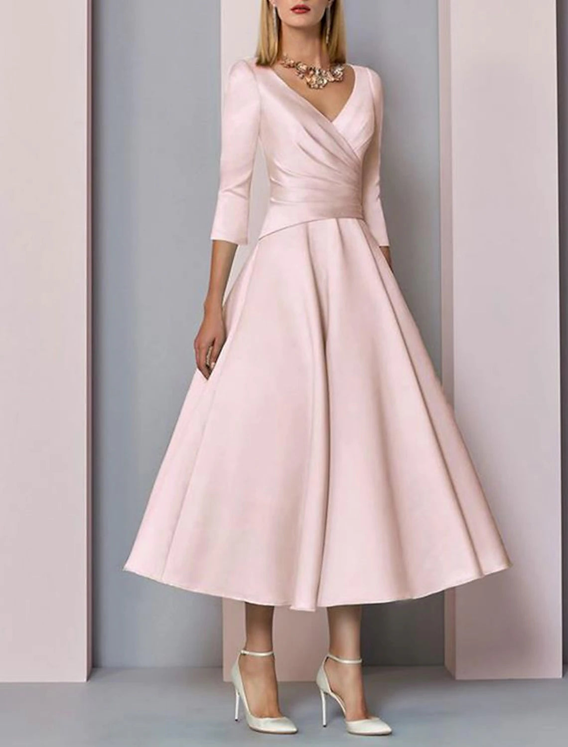 A-line tea-length satin dress with pleats and 3/4 sleeves
