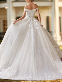 Ivory two-piece satin bridal gown featuring off-the-shoulder cap sleeves and beading appliques