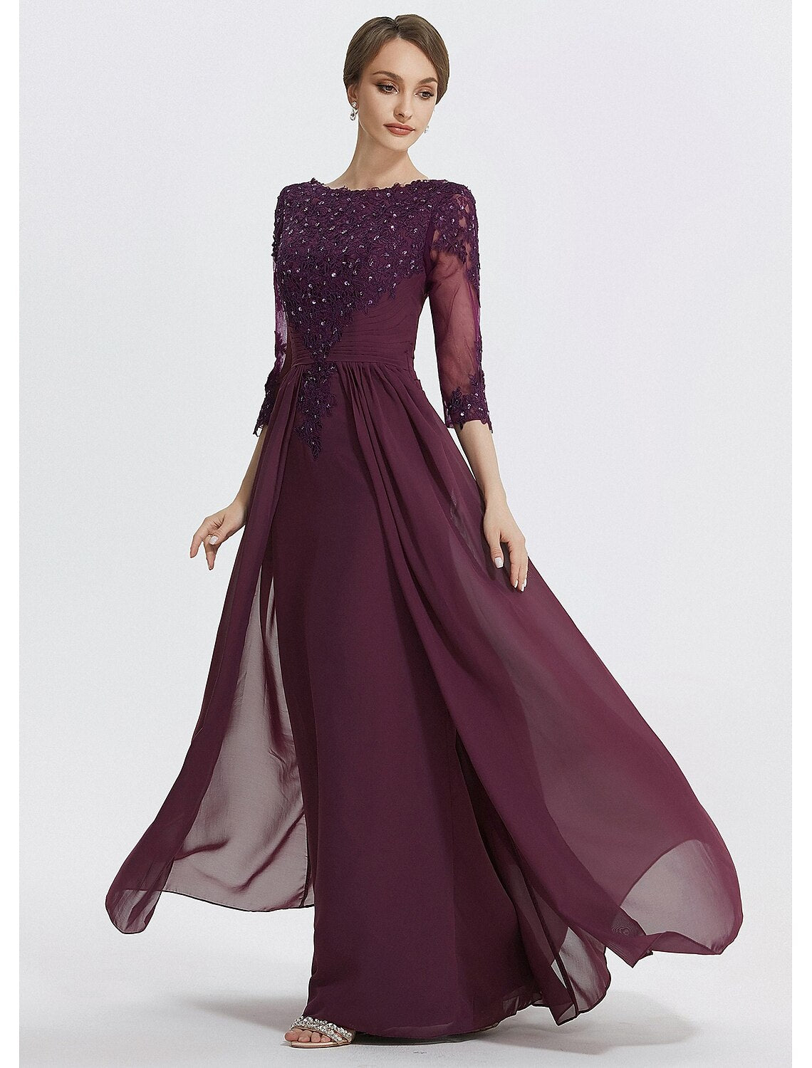 A-line chiffon and lace mother of the bride dress with jewel neckline and 3/4 length sleeves