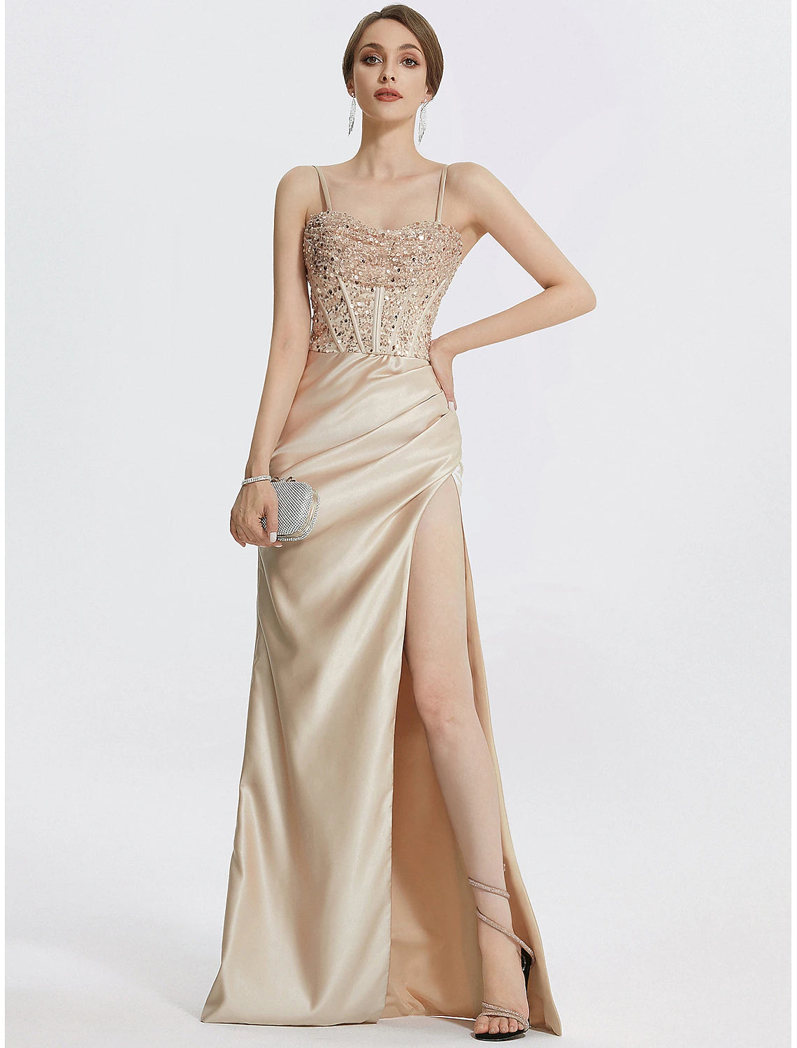 Sheath tea-length evening gown featuring a square neck, 3/4 length sleeves, and feather accents