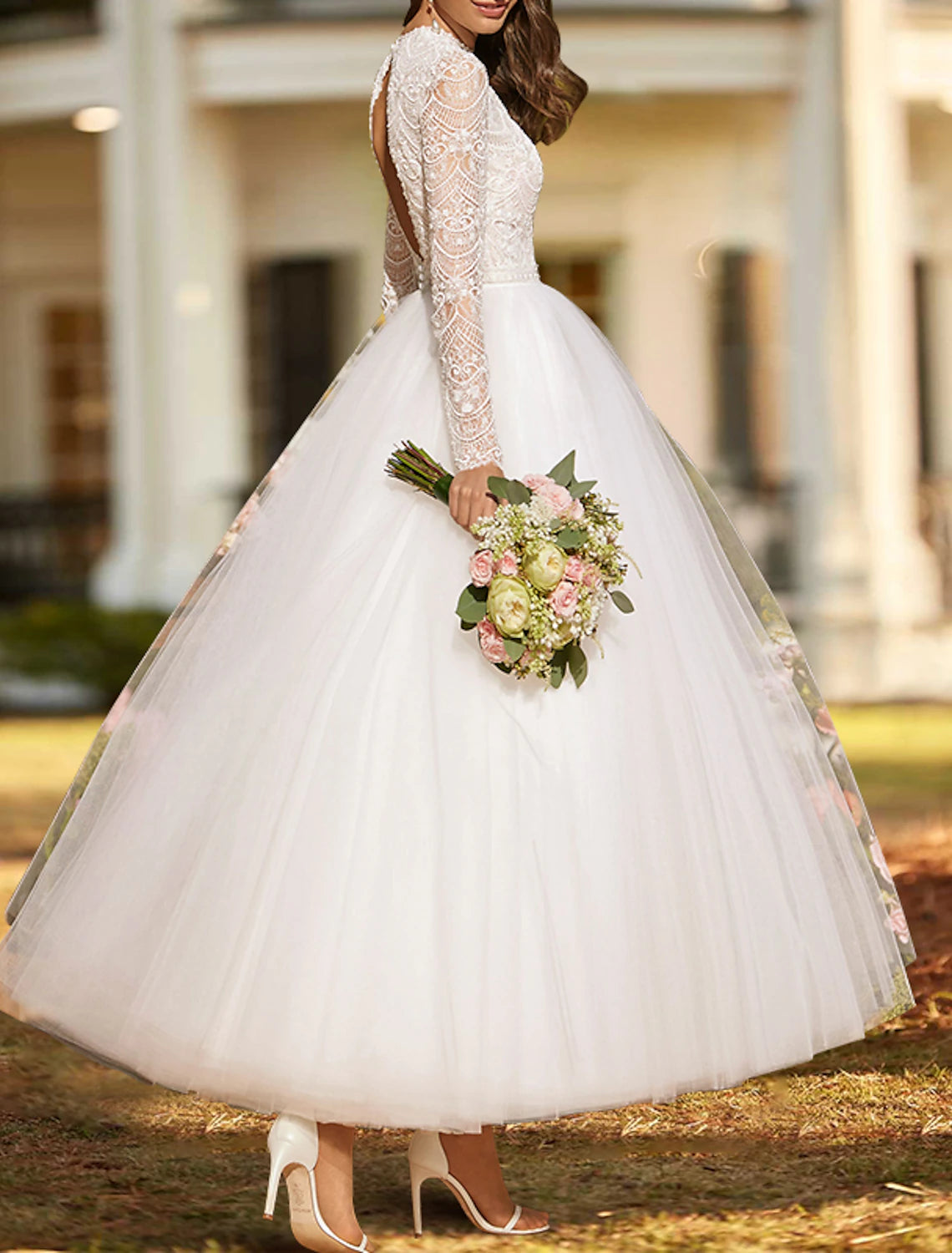 Ivory strapless sweetheart lace bridal gown with pleats and ankle length A-line skirt