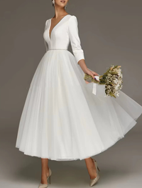Tea-length A-line chiffon wedding dress in Ivory with off-shoulder cap sleeves and ruched split front